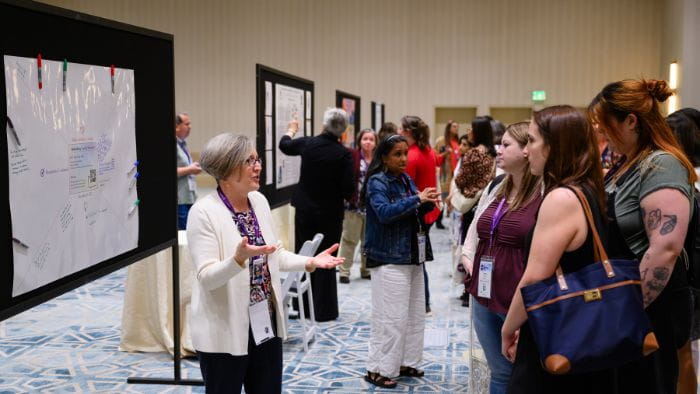 The Montessori Event 2024 - Research Poster Sessions - Crowd and Poster Presenters